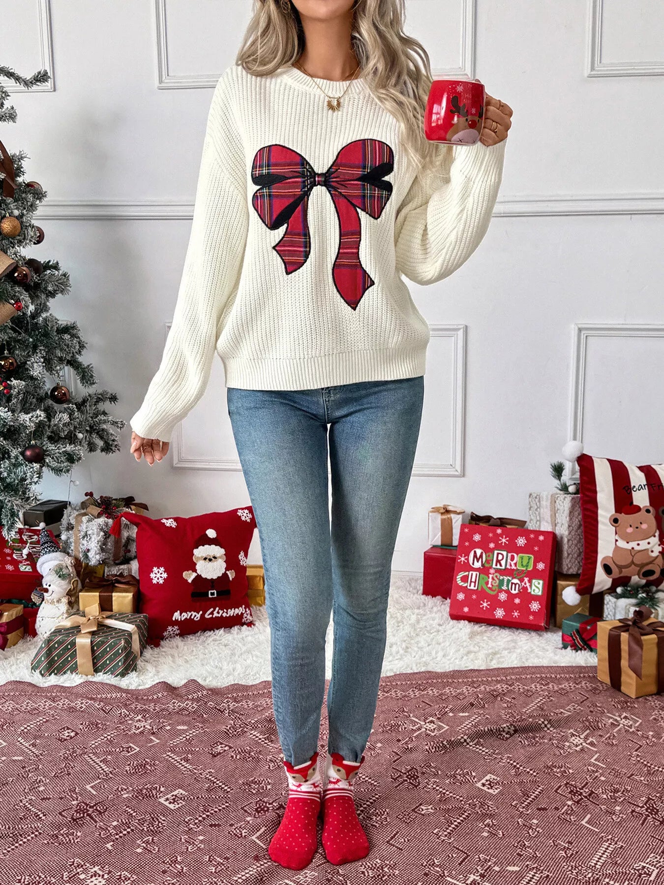 Pull de Noël à épaules tombantes avec nœud