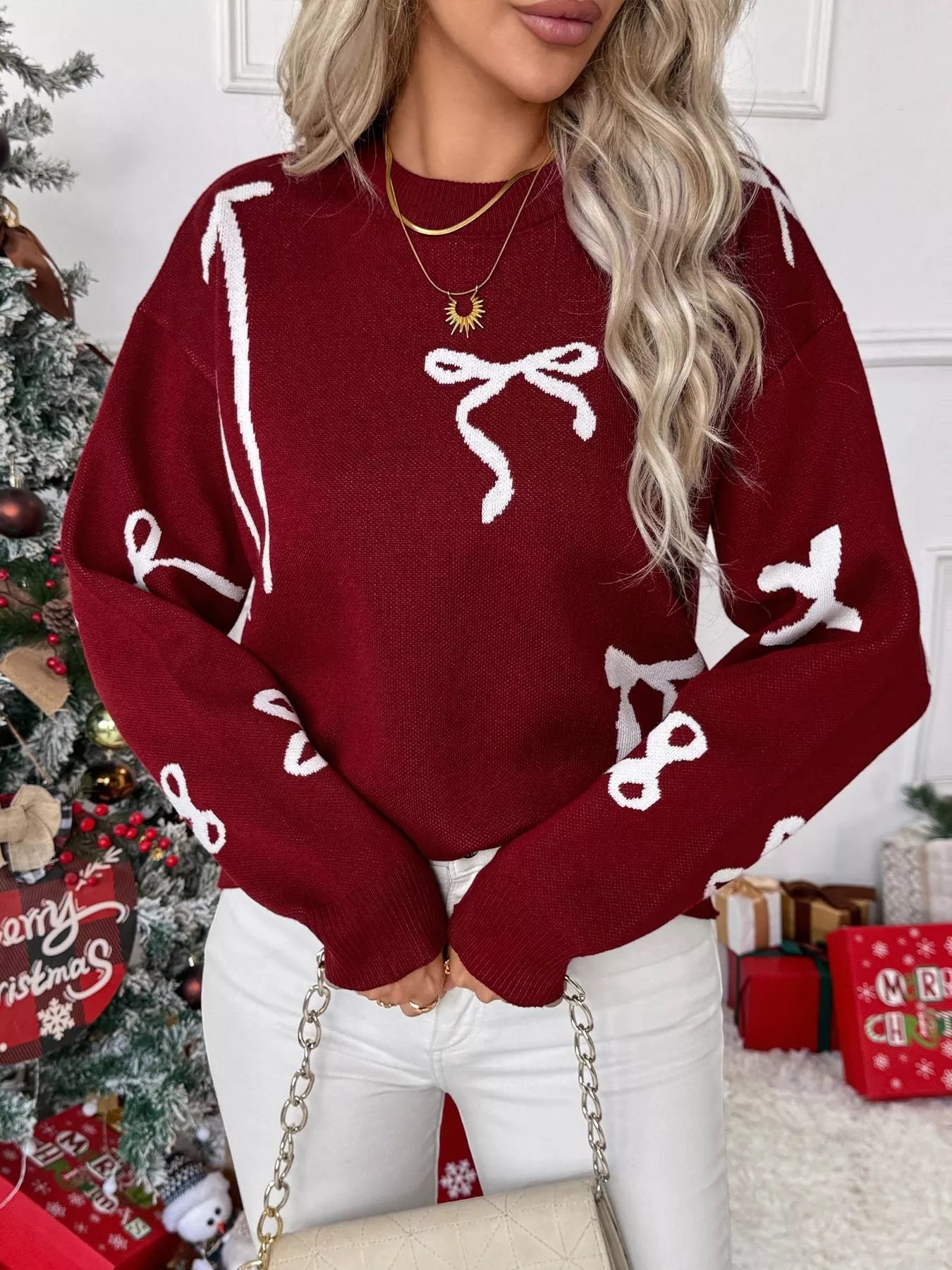 Pull de Noël rouge à col rond et manches longues avec nœud