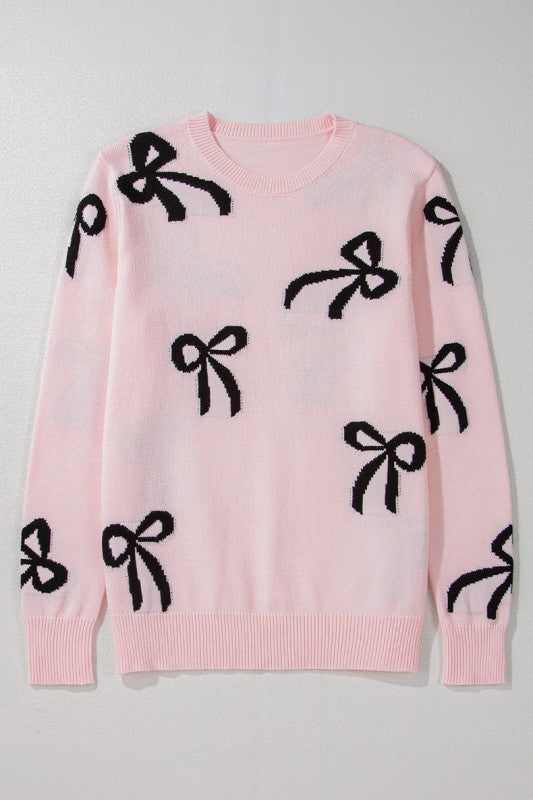 Pull de Noël rose clair à motif nœud tricoté et ample