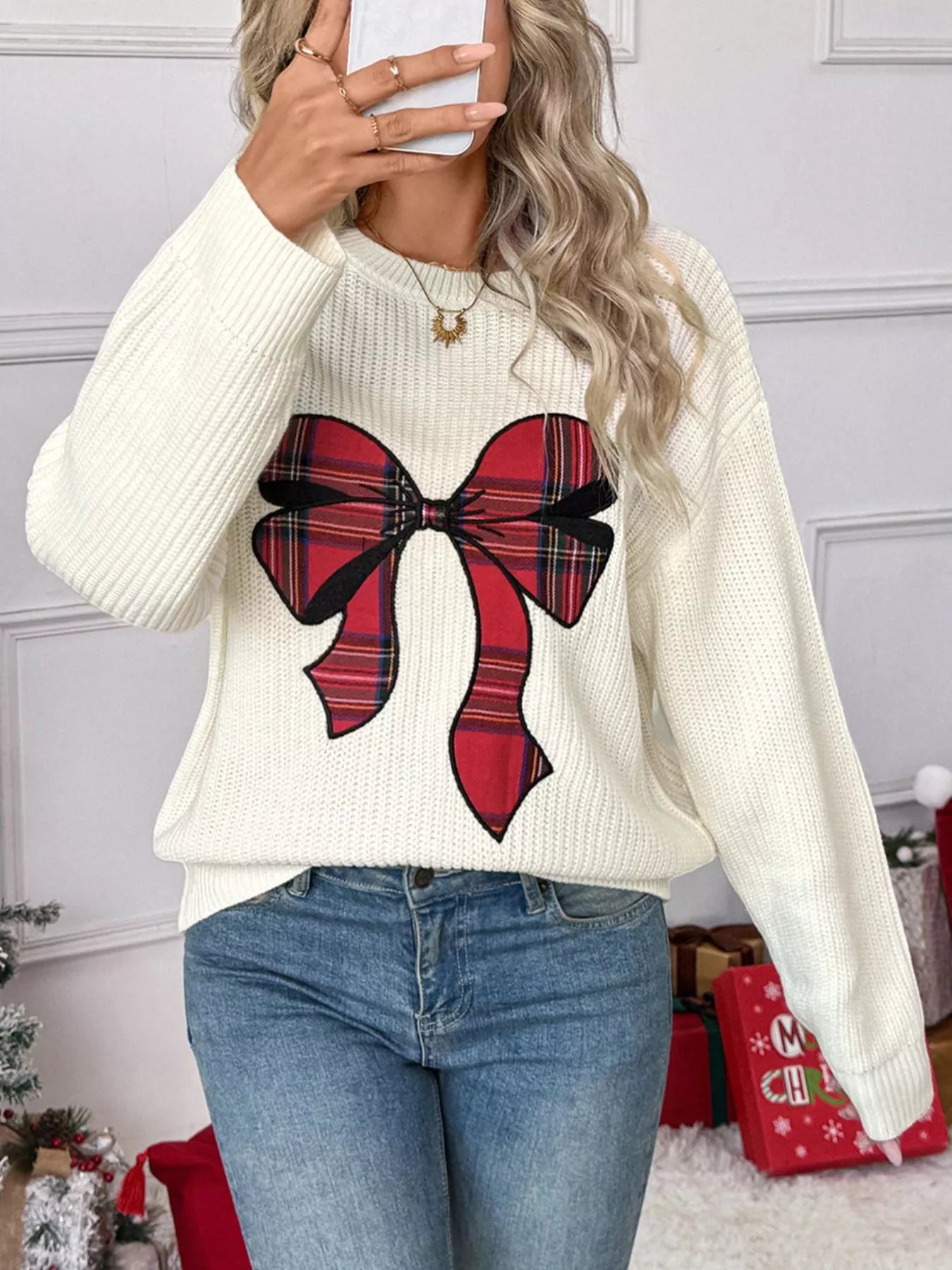 Pull de Noël à épaules tombantes avec nœud