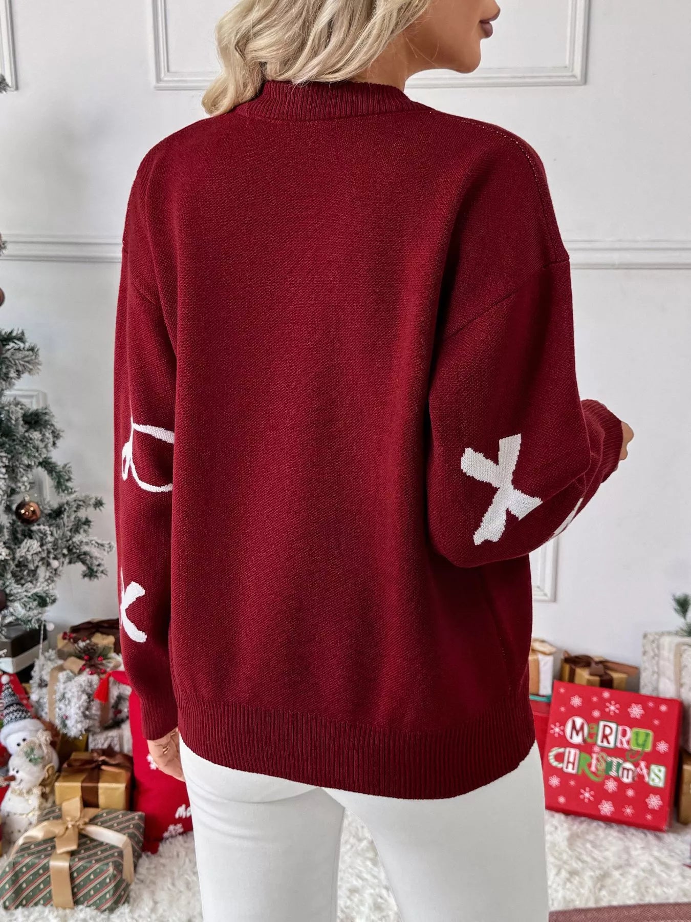 Pull de Noël rouge à col rond et manches longues avec nœud