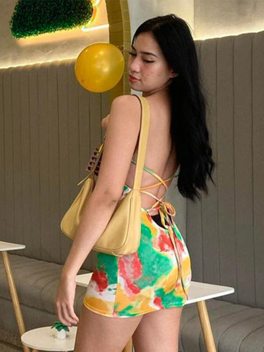 Onbely robe courte trapèze dos nu à fines brides taille marquée mode hawaienne vacances plage