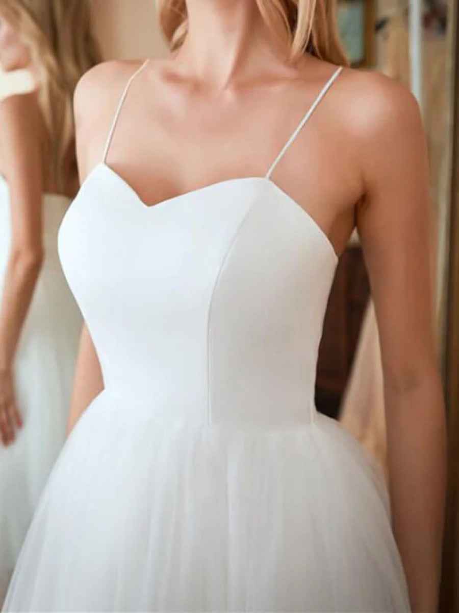 Onbely mi-longue robe trapèze unicolore tulle dos nu à fines brides col en V taille marquée élégant soirée cérémonie