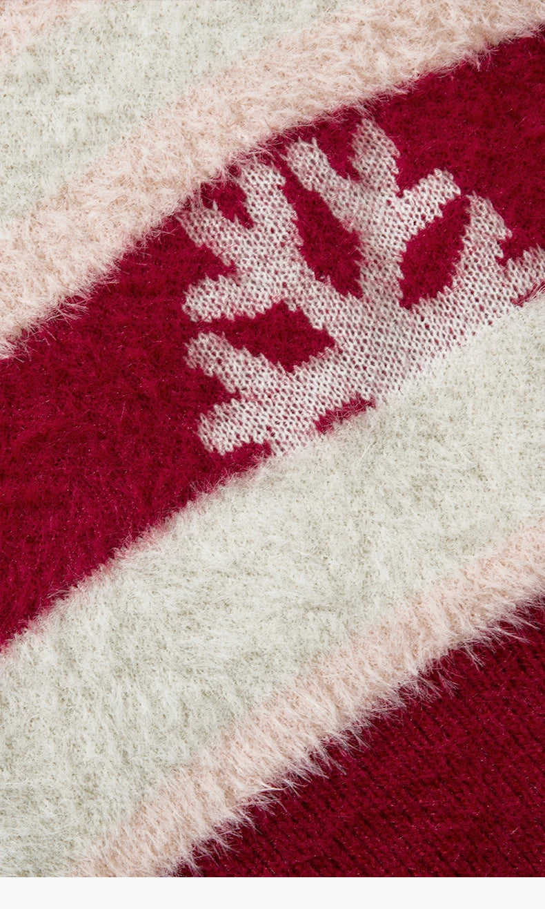 Pull de Noël tricoté à rayures et flocons de neige