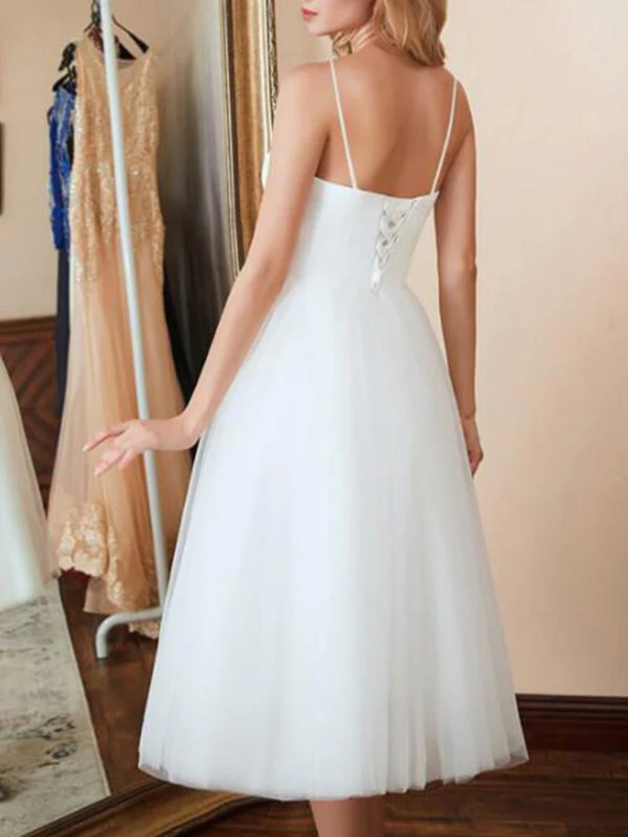 Onbely mi-longue robe trapèze unicolore tulle dos nu à fines brides col en V taille marquée élégant soirée cérémonie