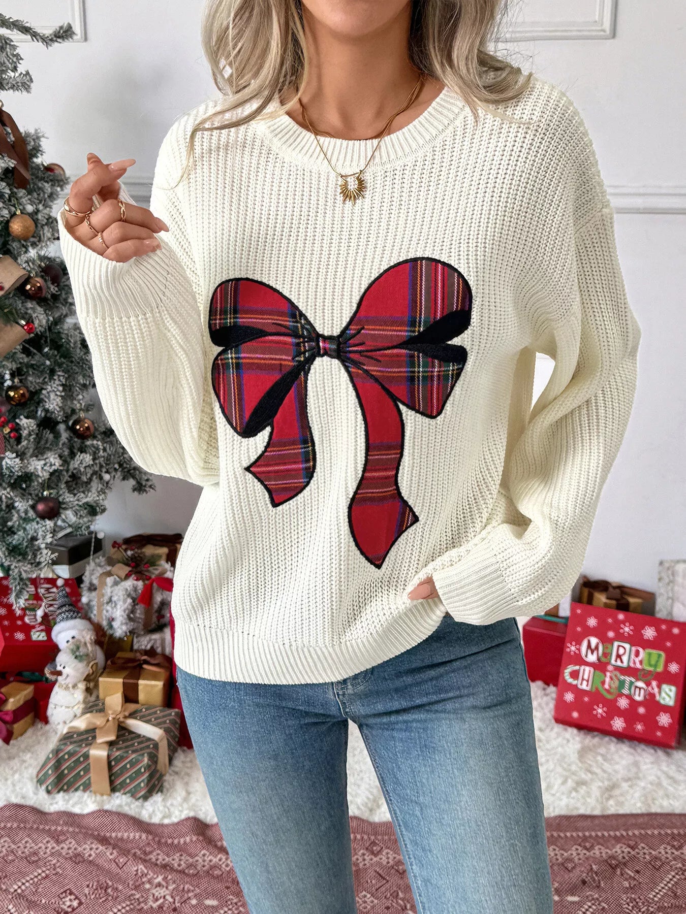 Pull de Noël à épaules tombantes avec nœud