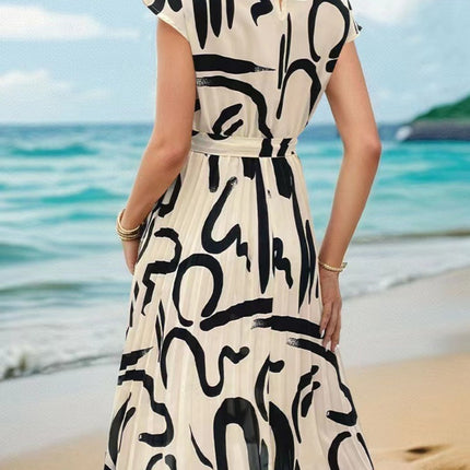 Onbely mi-longue robe trapèze imprimé à fleurie col rond manches courtes taille marquée mode vacances plage