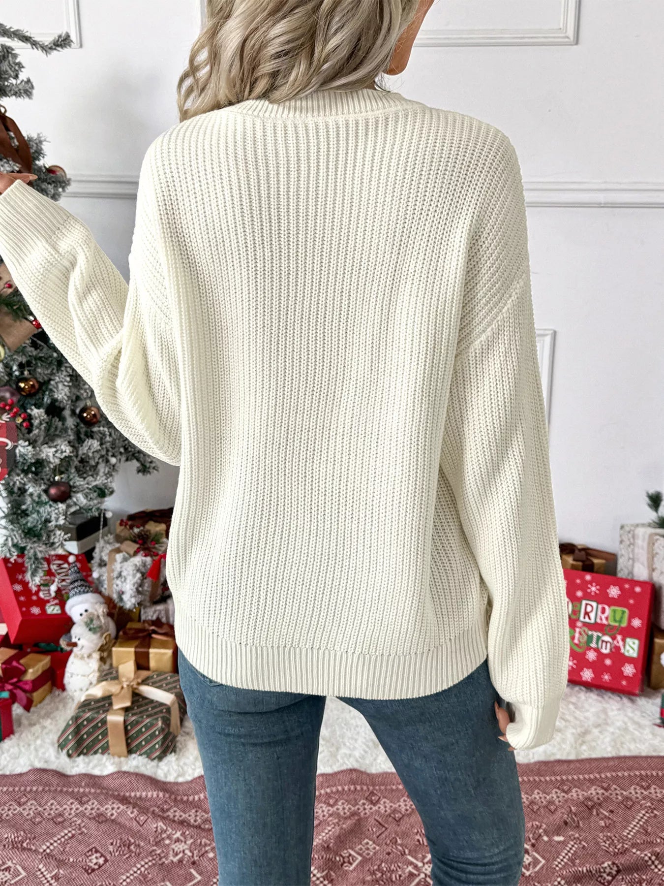 Pull de Noël à épaules tombantes avec nœud