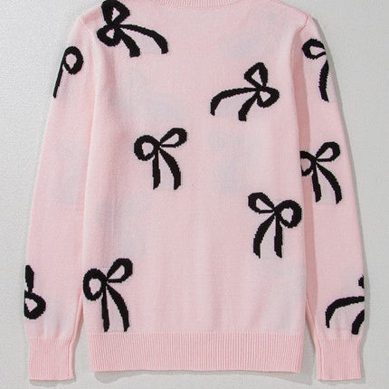 Pull de Noël rose clair à motif nœud tricoté et ample