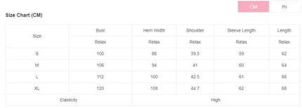 Pull de Noël rose clair à motif nœud tricoté et ample