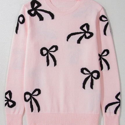 Pull de Noël rose clair à motif nœud tricoté et ample