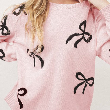 Pull de Noël rose clair à motif nœud tricoté et ample