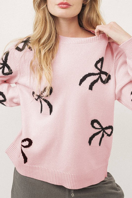 Pull de Noël rose clair à motif nœud tricoté et ample