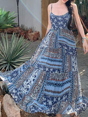 Onbely long dress with floral print and thin bohemian straps in blue