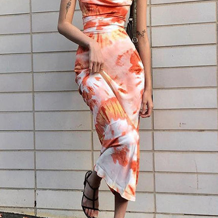 Onbely mi-longue robe moulante imprimé à fleurie dos nu à fines brides cintrée mode vacances