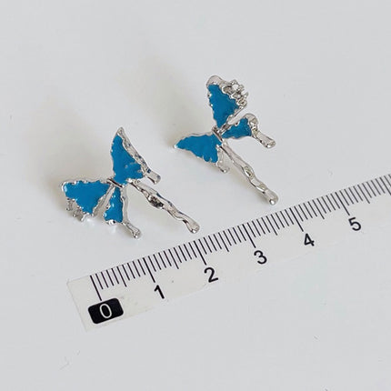 Bleu papillon des boucles d'oreilles mode - onbely