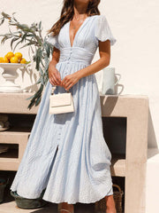 Onbely long dress with buttoned v-neck and puffed sleeves, elegant