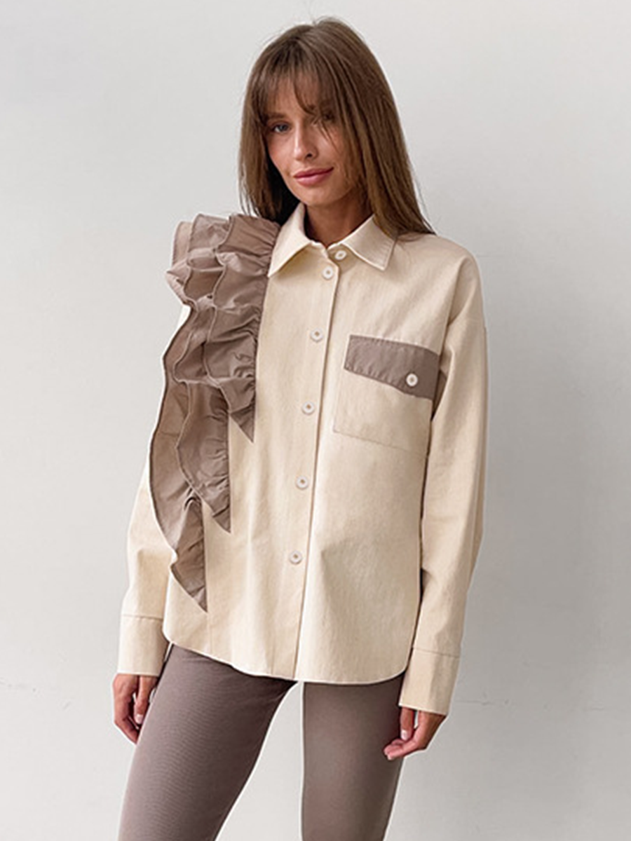 Onbely Elegant and modern shirt with asymmetrical hem