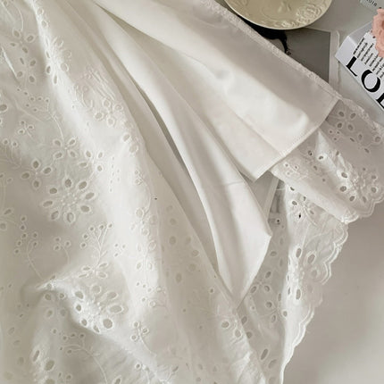 Onbely robe longue dos nu en broderie anglaise blanche fendue sur le côté mode boho dress