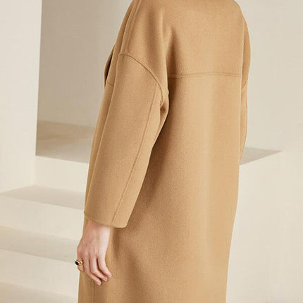 Onbely mi-longue manteau en laine double boutonnage épaule tombante femme