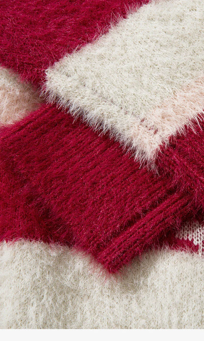 Pull de Noël tricoté à rayures et flocons de neige