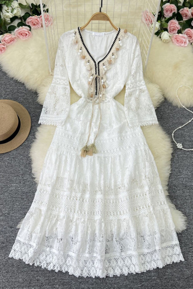 Onbely robe longue bohème à broderie anglaise avec pompons et manches évasées pour plage et vacances boho dress