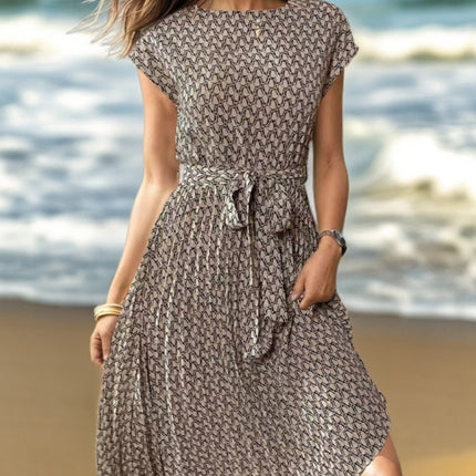 Onbely mi-longue robe trapèze imprimé à fleurie col rond manches courtes taille marquée mode vacances plage