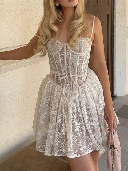 Onbely robe courte trapèze jacquard dos nu à fines brides mode cocktail vacances bal de promo