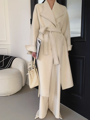 Onbely wool coat with contrasting trim and elegant belt