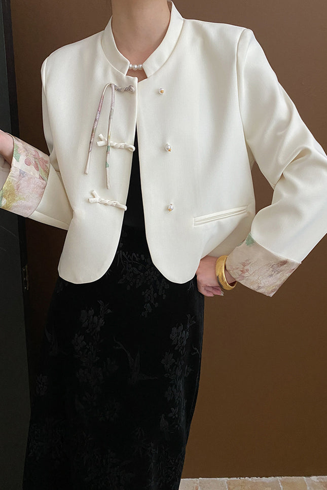 Onbely veste élégante à boutons chinois avec poches et col montant